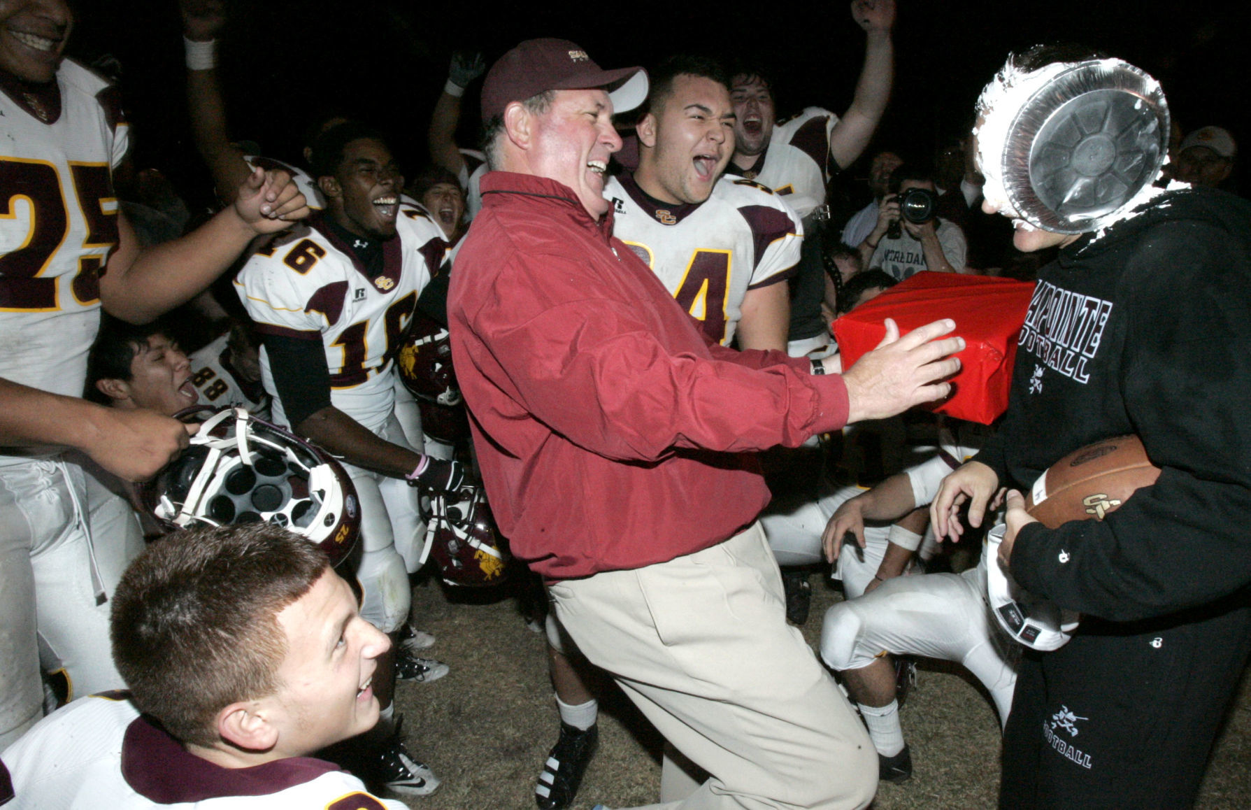 Sapolinte HS football coach Dennis Bene